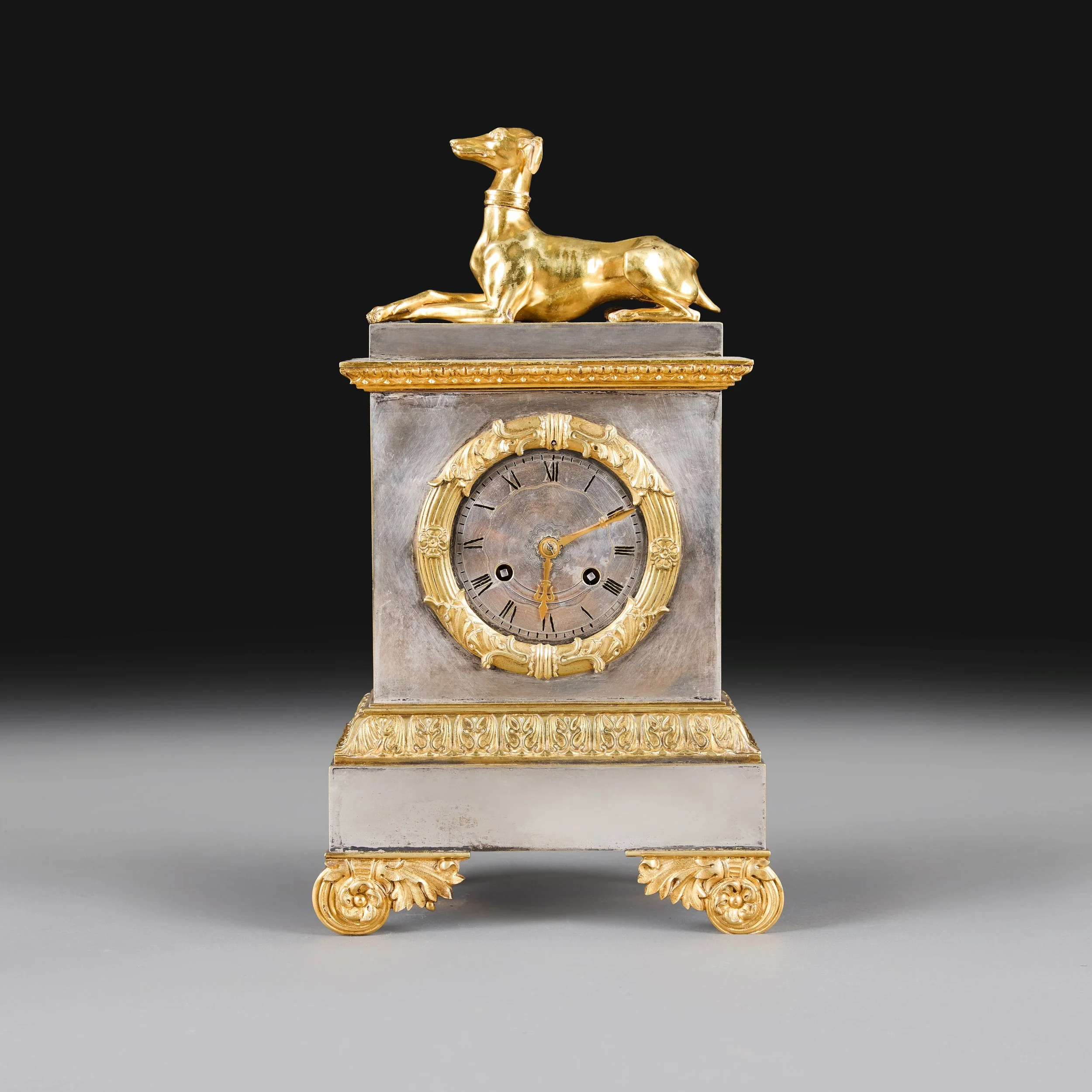 A FRENCH EMPIRE PERIOD MANTEL CLOCK