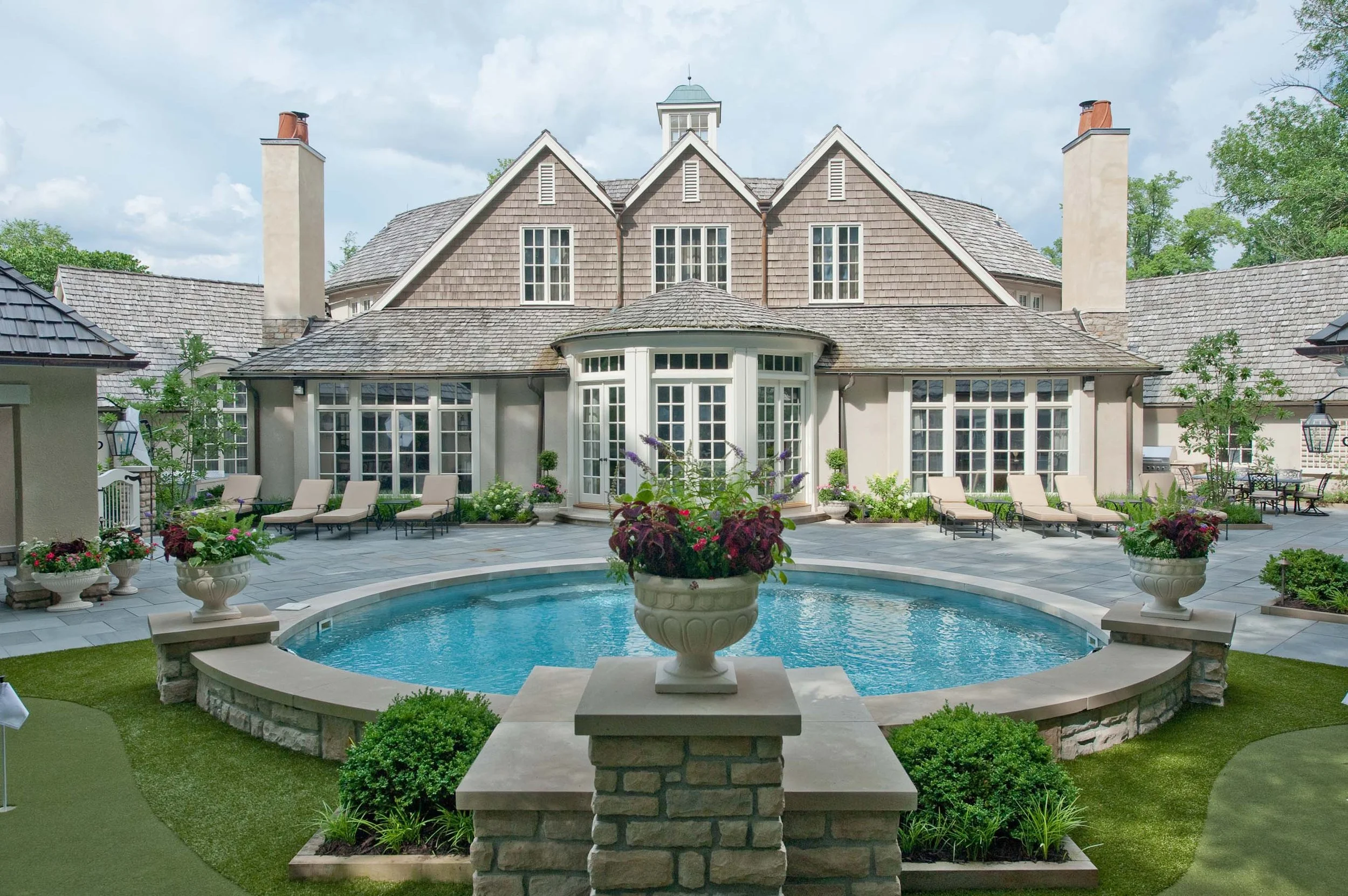 A large Bexley Estate featuring a new pool and custom landscaping.