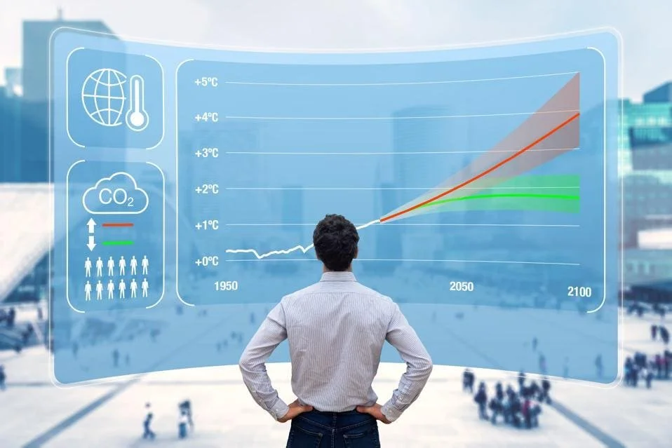 Image of a man looking at a futuristic climate risk dashboard