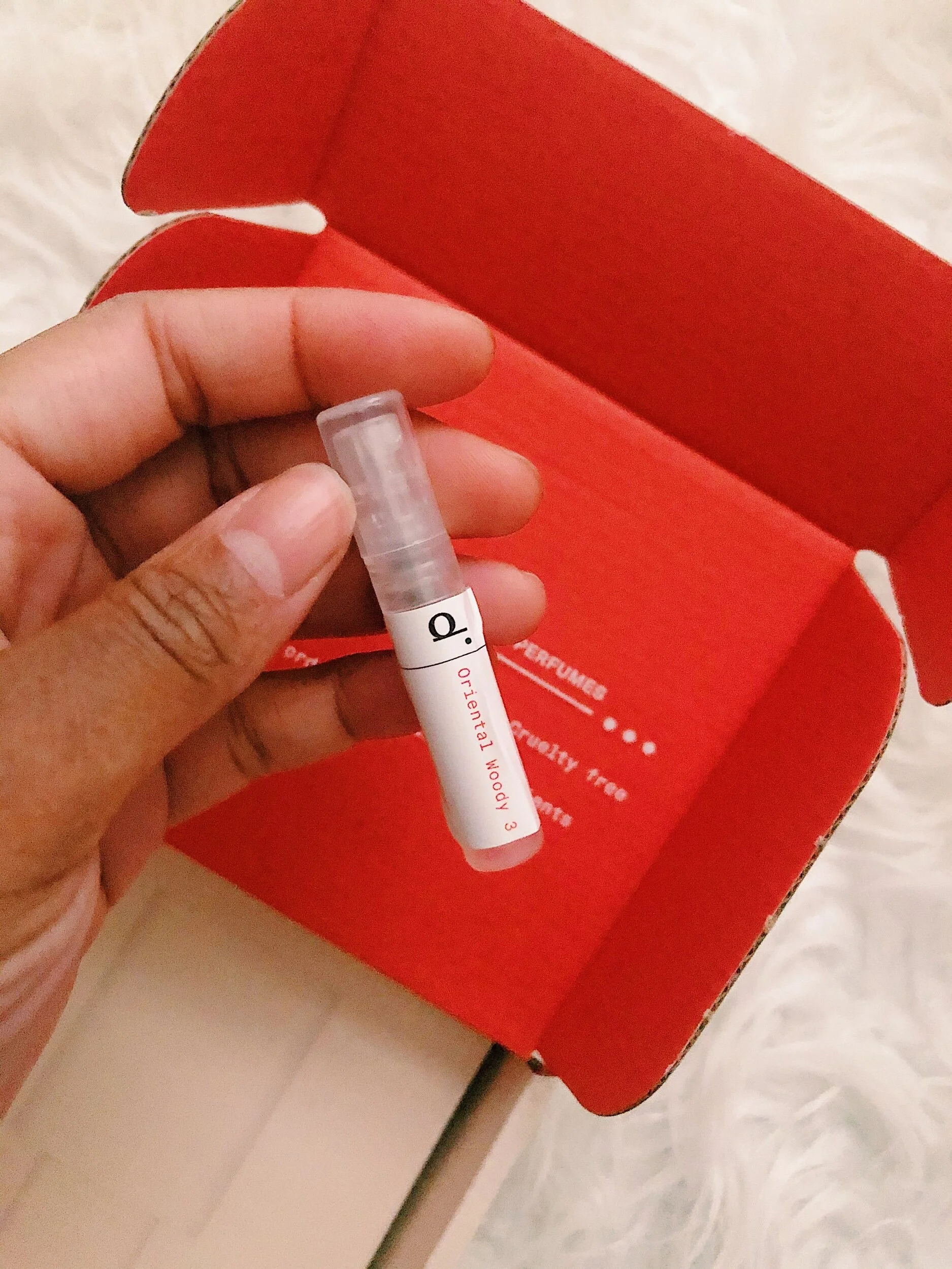 The sample provided in your purchase to try before fully committing the the bottle fragrance.