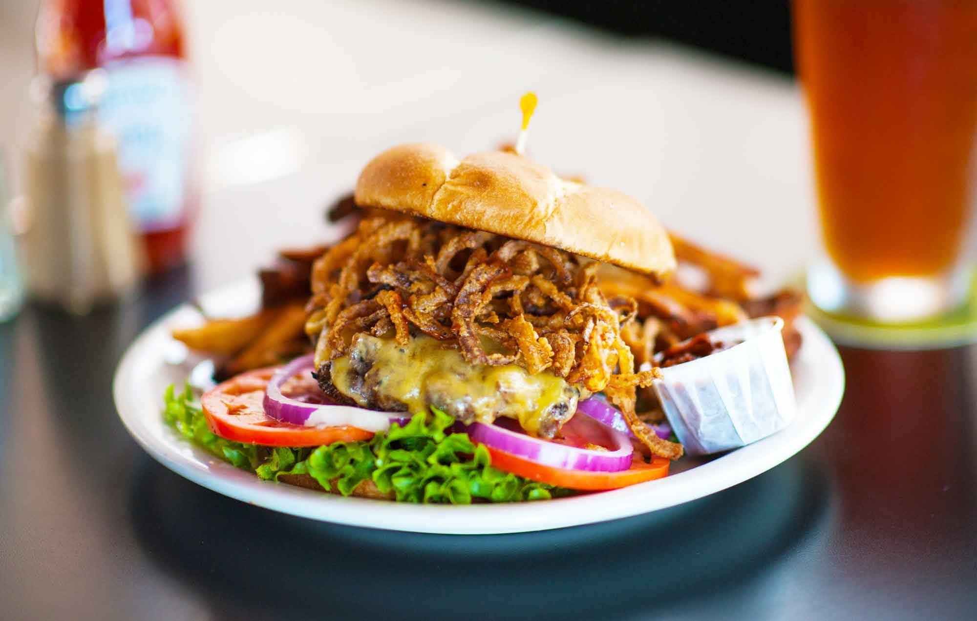 hudson-restaurant-seattle_cheeseburger-with-fried-onions.jpg