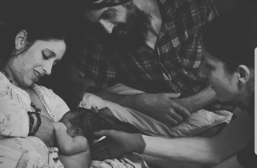 Midwife-Naomi-Bjorgan-LM-Delivering-Baby-During-Homebirth-In-Redding-California