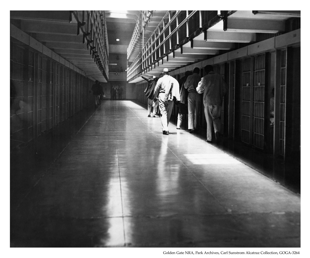 Alcatraz Inmates Walking Down the Cell Block