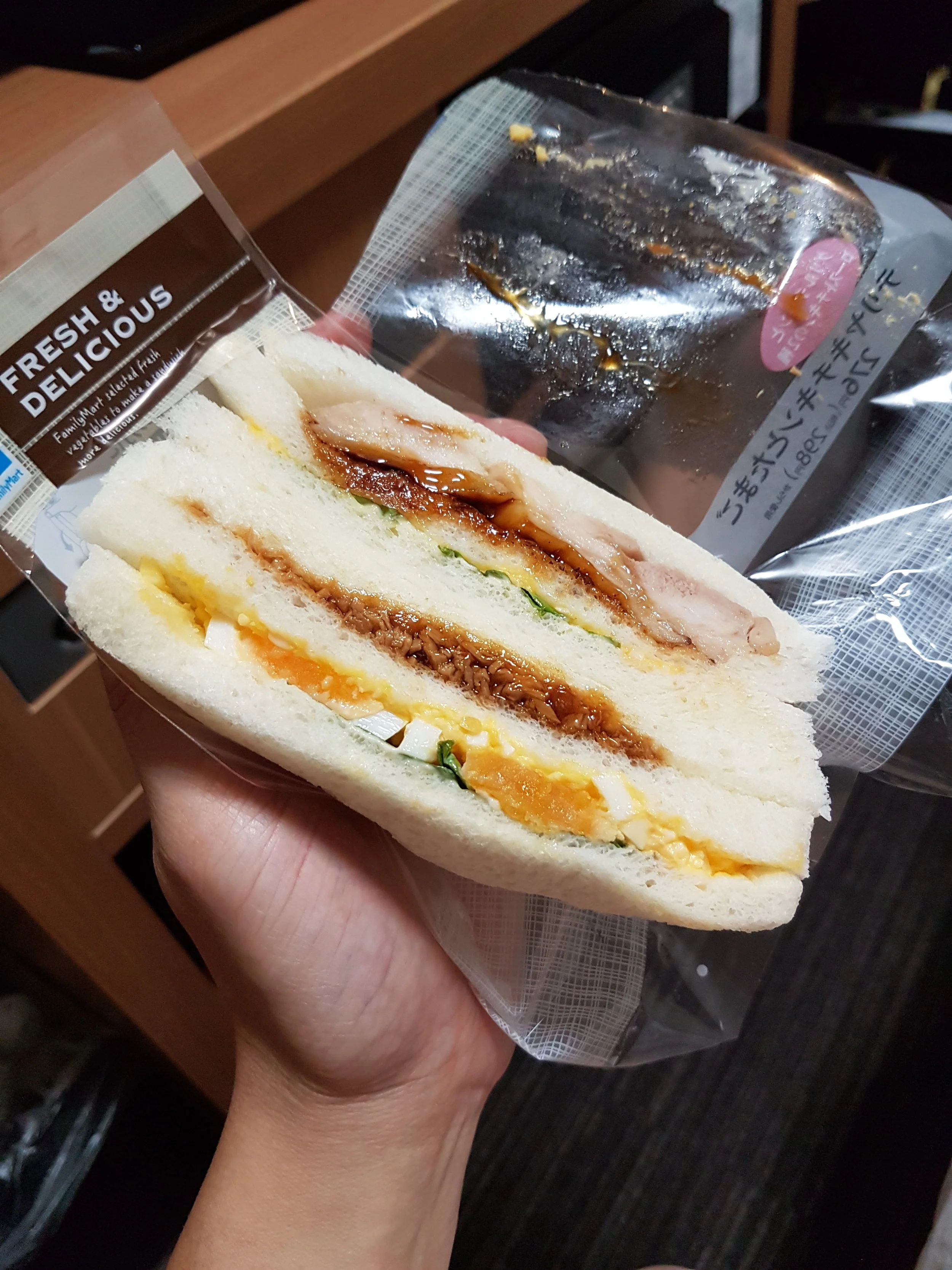 Family Mart's sandwiches... egg salad + chicken teriyaki and ground pork!