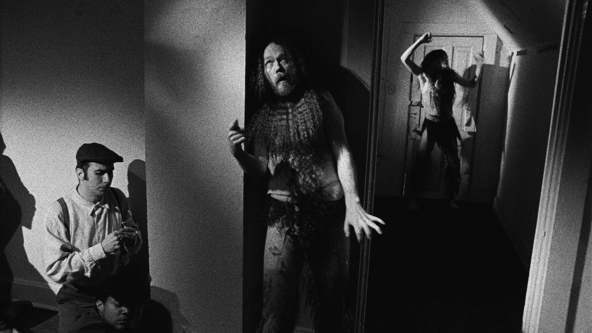Catherine Sullivan, Triangle of Need, 2007. In collaboration with Sean Griffin, Dylan Skybrook, and Kunle Afolayan Triangle of need ( Chicago) , 3 channel projection, 16 mm film transferred to digital media, black & white, sound, 19’32 minutes