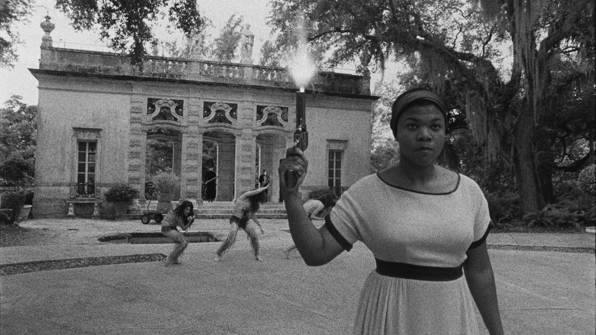 Catherine Sullivan, Triangle of Need, 2007. In collaboration with Sean Griffin, Dylan Skybrook, and Kunle Afolayan Triangle of need (vizcaya), channel projection, 16 mm film transferred to digital media, black & white : color, sound, 31’36 minutes