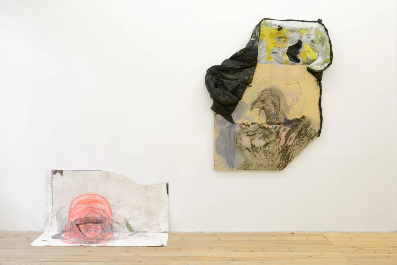 left : Henrik Olai Kaarstein, Dzhokhar Rose , 2013, acrylic paint, iridescent medium, vinyl paint, charcoal, silicone, oil pastels, cardboard, (Unfolded) 141 x 114 cm right : Henrik Olai Kaarstein, Night, Fall , 2013, acrylic paint, iridescent medium, oil pastels, charcoal, acetone, office table, sleeping bag, 191 x 134 cm