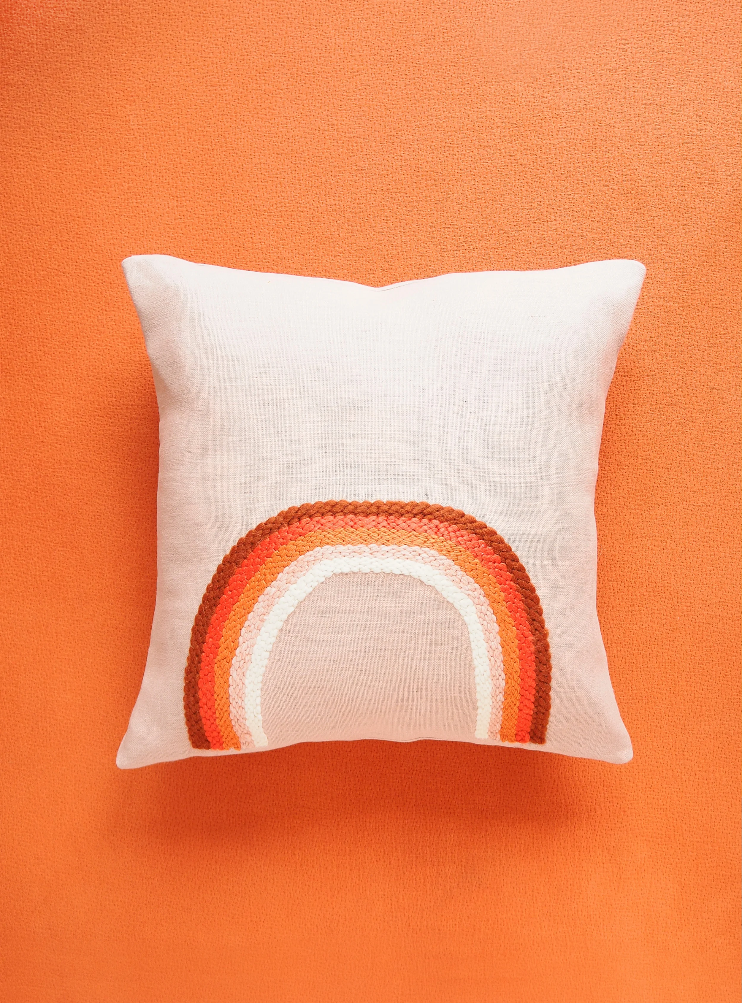 CLARE NICOLSON PINK RAINBOW CUSHION.jpg
