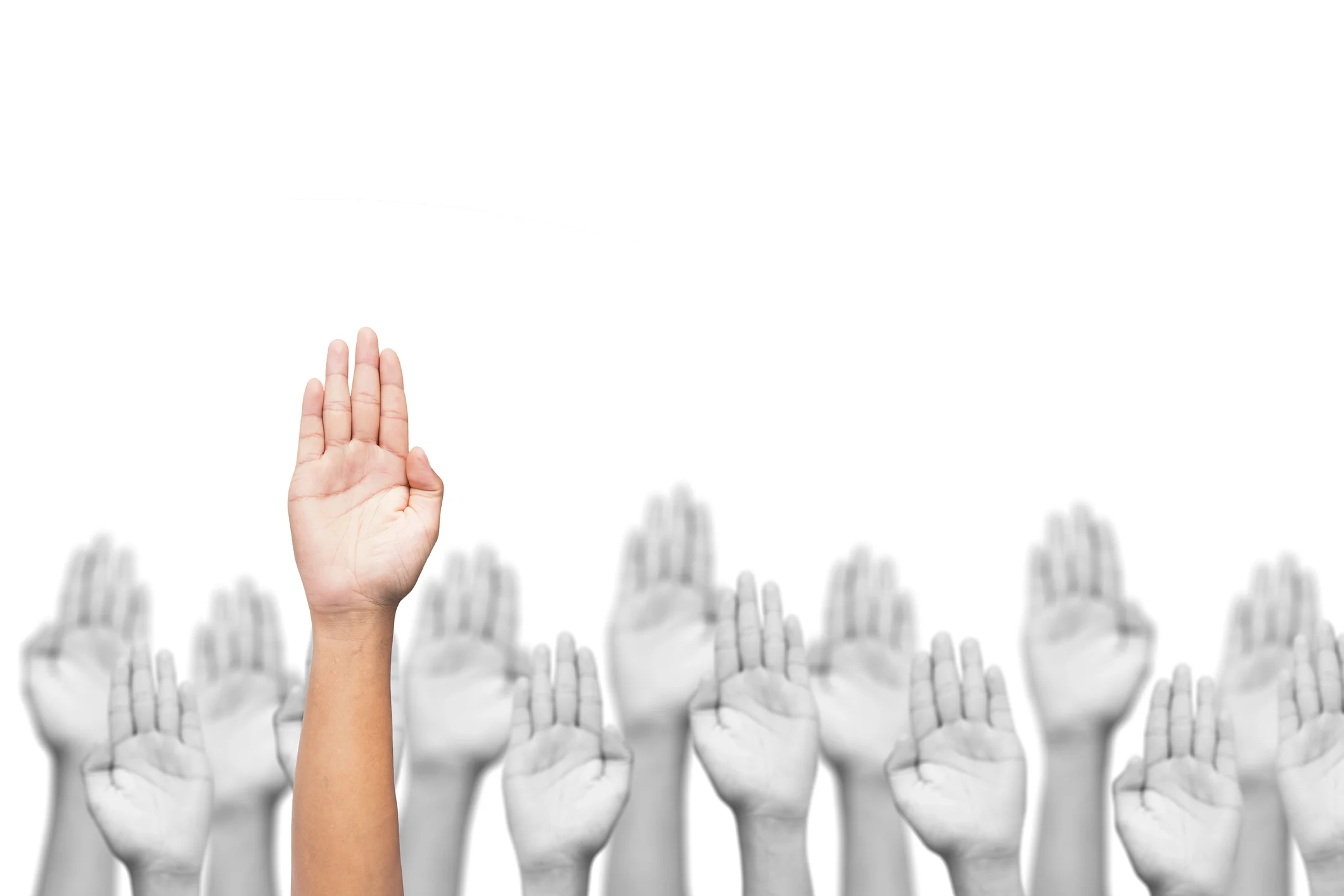 Volunteer With Unspoken Voices Raised Hands Image (Licensed through Getty Images)