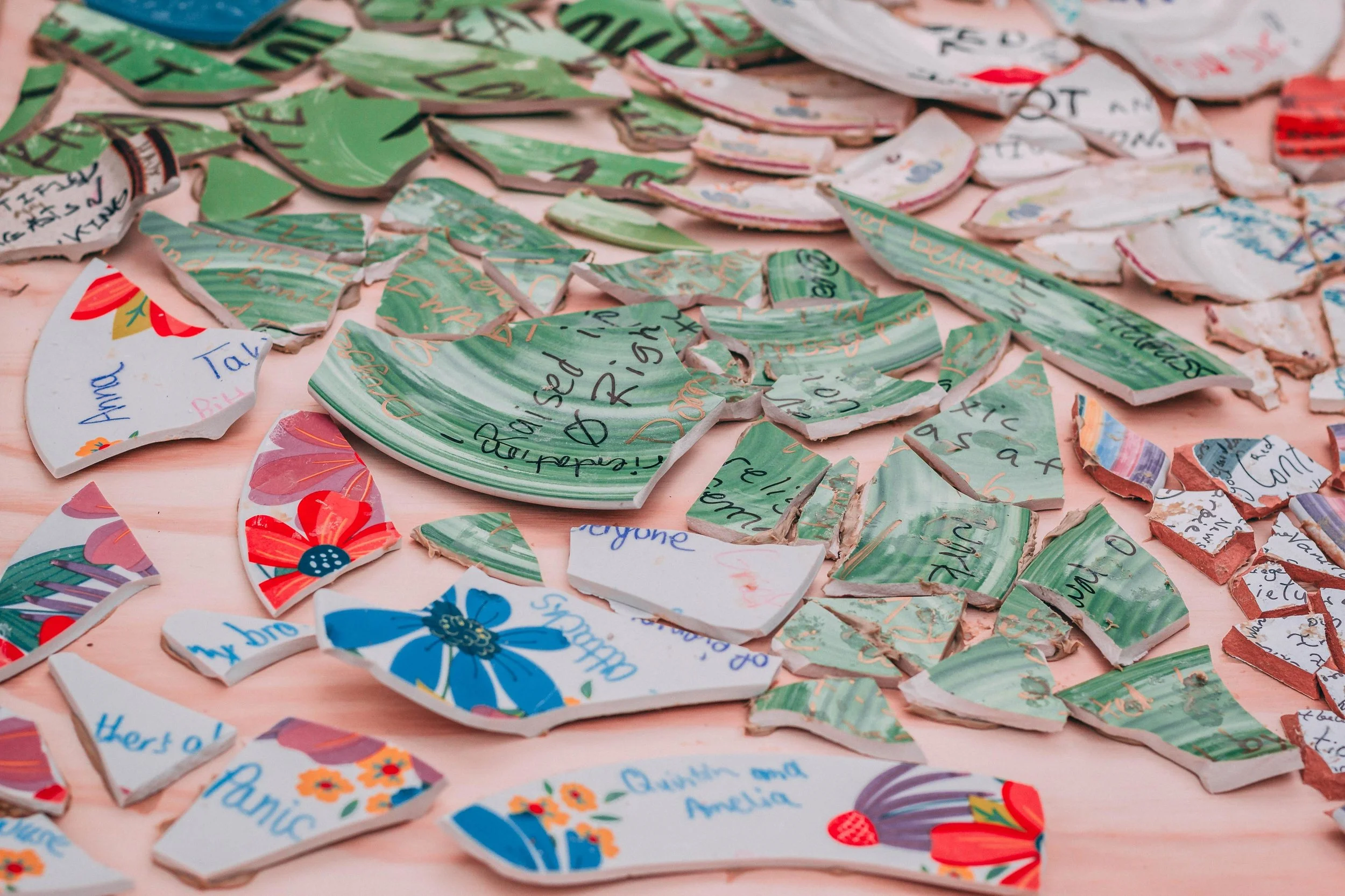 Broken plate shards at the 2018 Slut Walk, Twin Cities Fragmentary , Unspoken Voices event.
