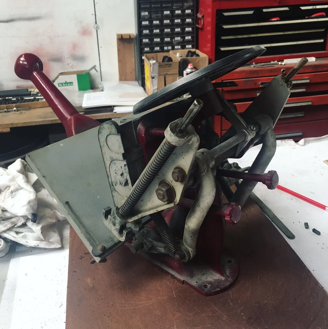 We print using a 1932 Adana Letterpress that we have taken great care of restoring. Here, being service. 