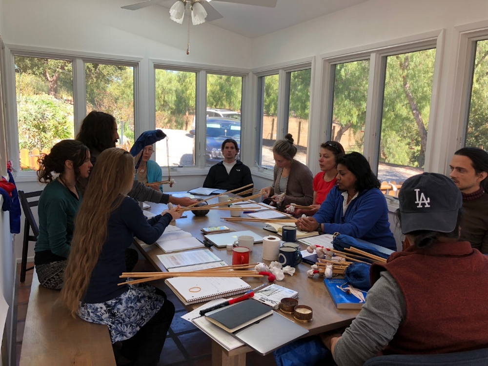 Studying Yukchö stick therapy, one of the important external therapies used in Traditional Tibetan Medicine with Dr. Nida Chenagtsang at Pure Land Farms