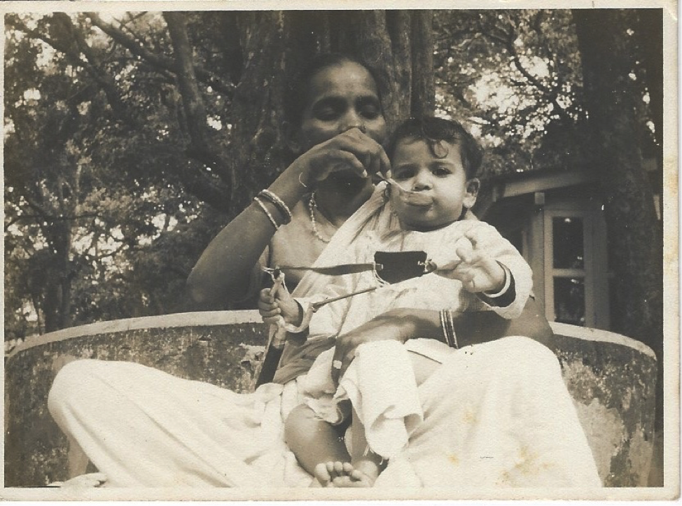 Soondra feeding me on vacation in the hills (I’m around 9 months old here).