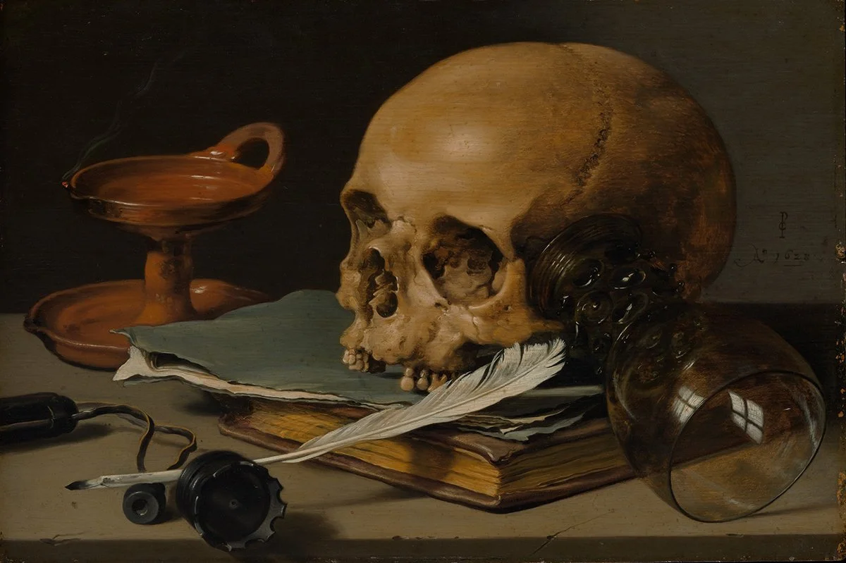 Still Life with a Skull and a Writing Quill Pieter Claesz.jpg