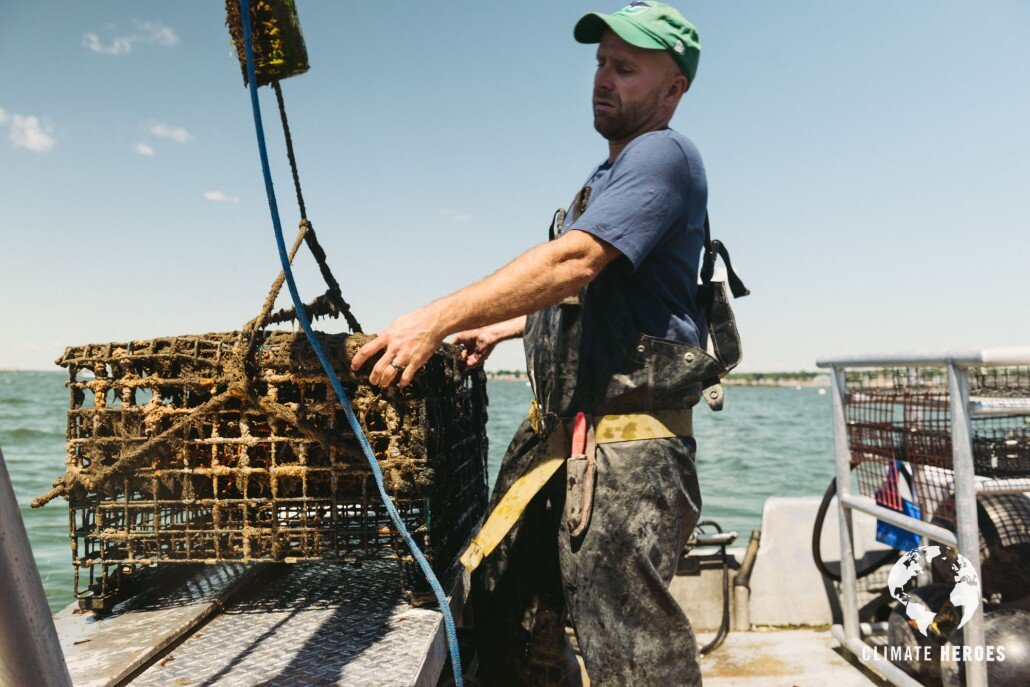 Bren hauling an oyster cage 2 (credit Climate Heroes).jpg