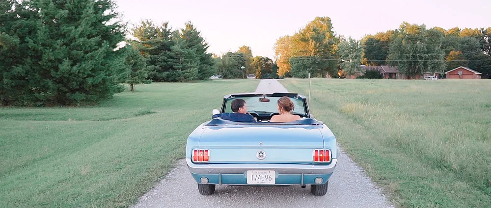 Groom-Bride-Driving-Away.jpeg