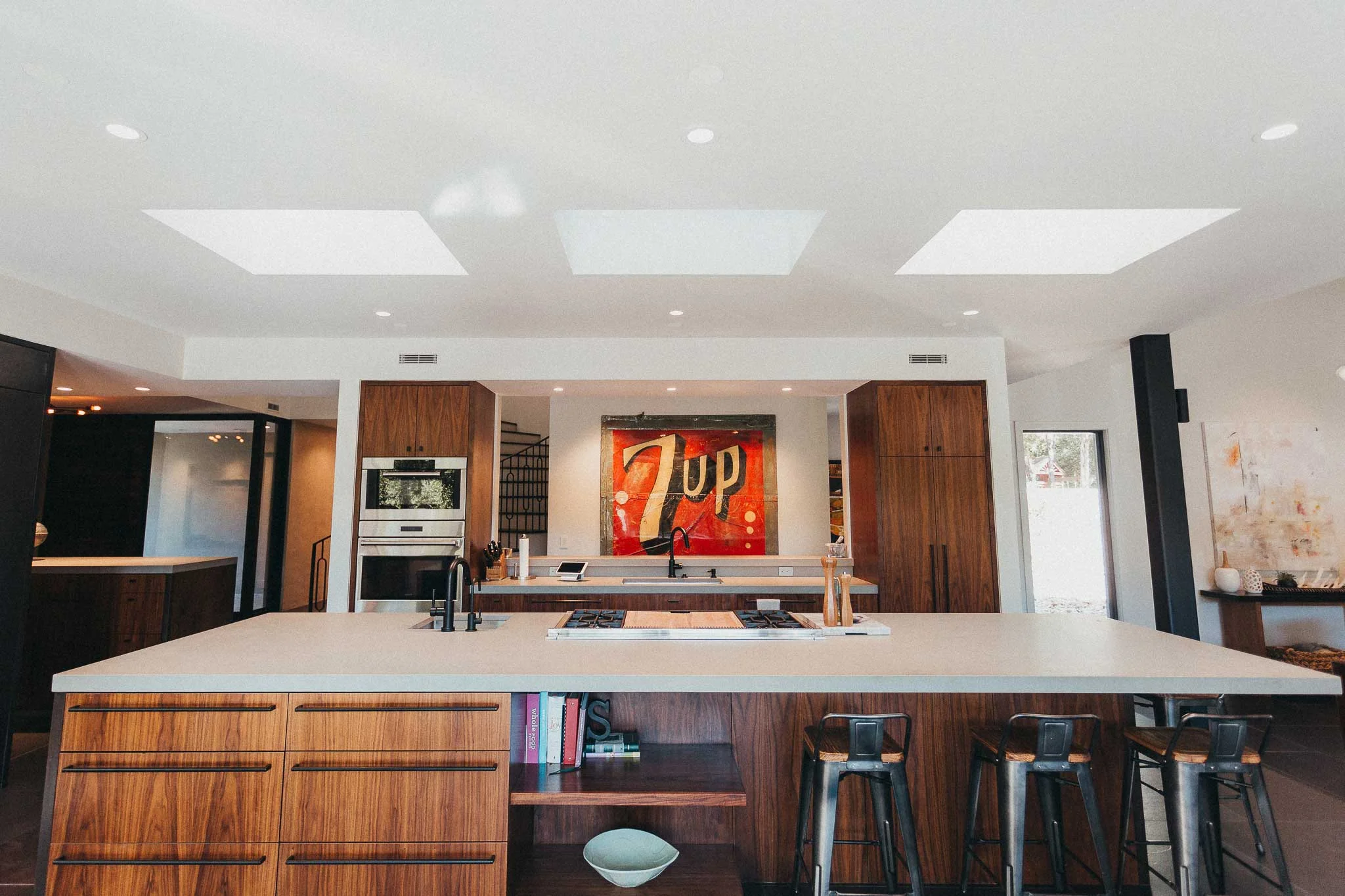 Along with plenty of natural light, the kitchen holds in-ceiling speakers and Lutron lighting, which can all be controlled via a tabletop control panel