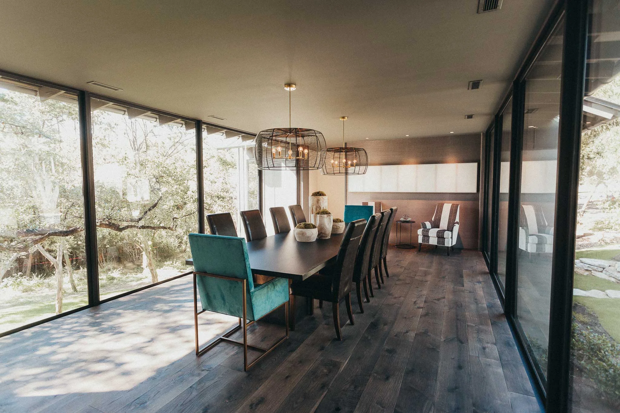 The dining room sits on a breathtaking suspended walkway and invisible speakers hide in the ceiling to not take away from the views