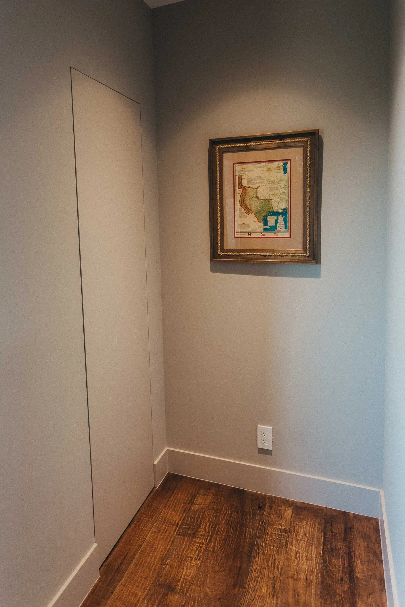 The architect and builder helped design a small, concealed closet to hold the equipment rack