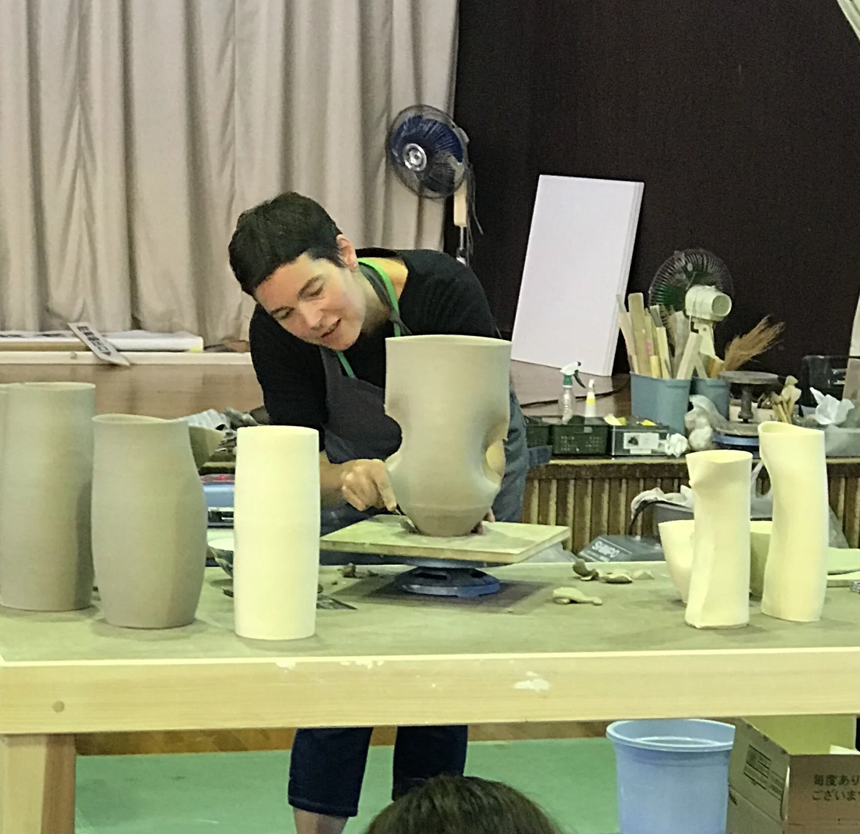 Pushing and cutting to alter the shape.