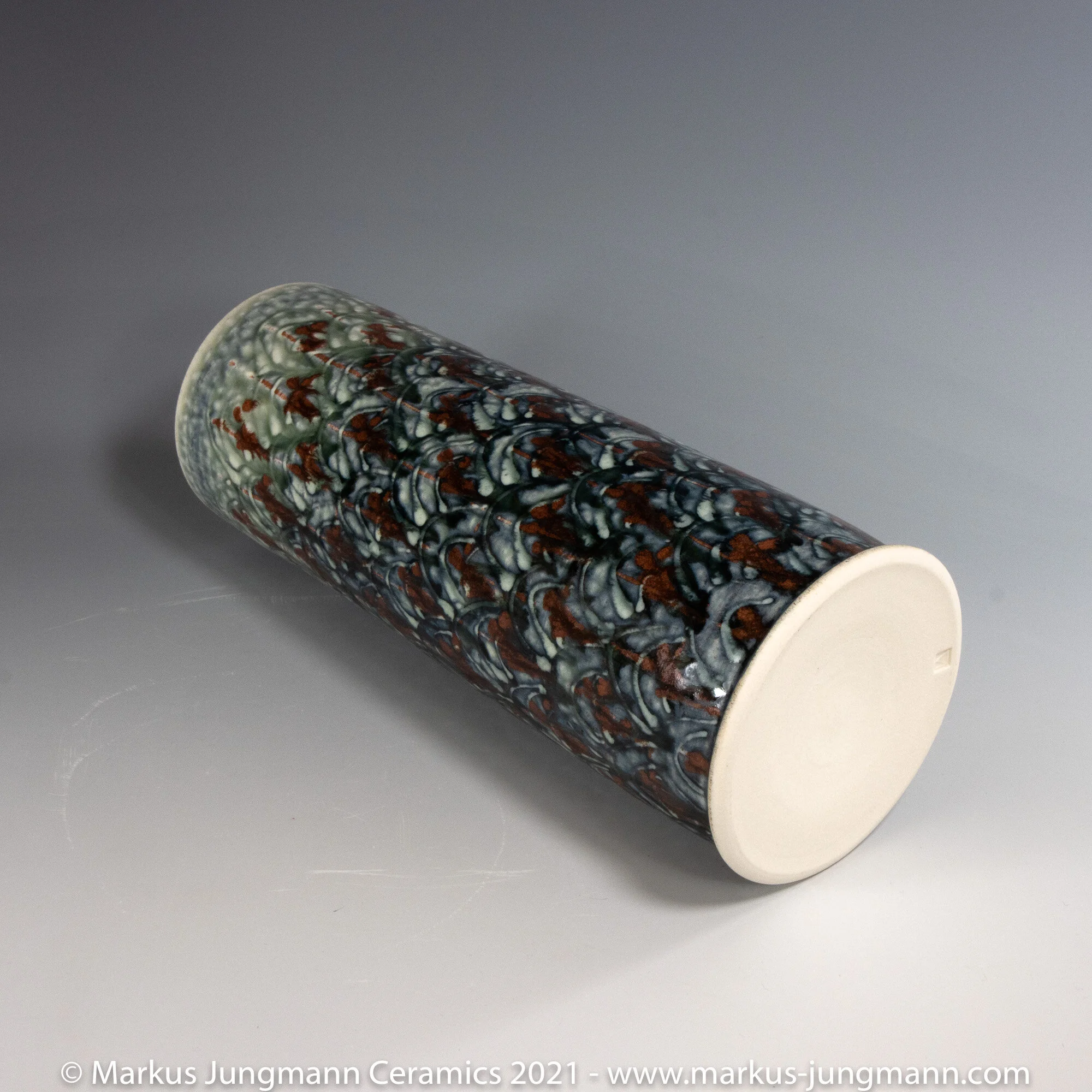 Hand made on the potters wheel, hand decorated porcelain vase. Approximately 26 cm high / ~ 9.5 cm diameter