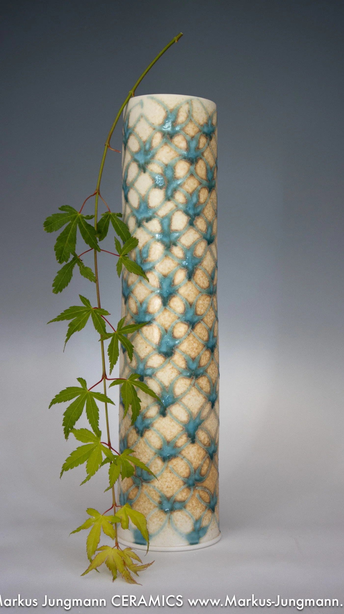 markus-jungmann-porcelain-vase-vesica-iii-38cm-with-maple-twig.jpg