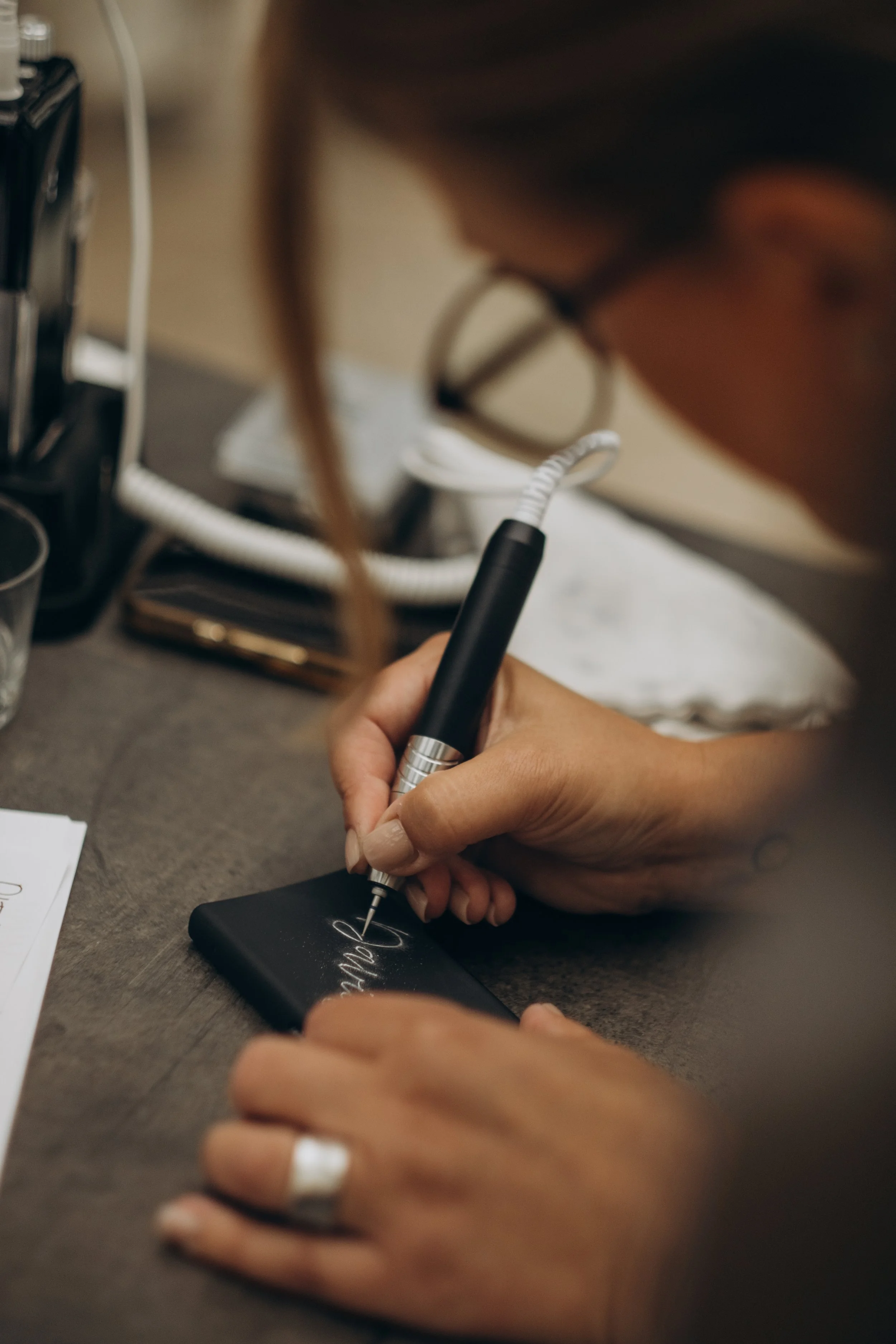 Live engraving event by Karin Rosenquist-Schager Brand Activation engraving