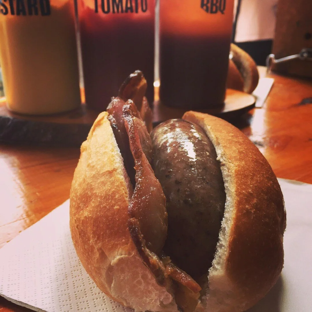 Prepare your taste buds for Matakana Bacon ⚡ Your choice of sausage; Pork &amp; Bacon; Beef, Bacon &amp; Cheese or Pork &amp; Oyster with fried onions, Puhoi Pantry Relish, + rashers of their bacon in a freshly baked bun! We're down to our last 100 tickets, and there will be no door sales. Head to iTicket.co.nz to get yours before they sell out #oysterfestmatakana