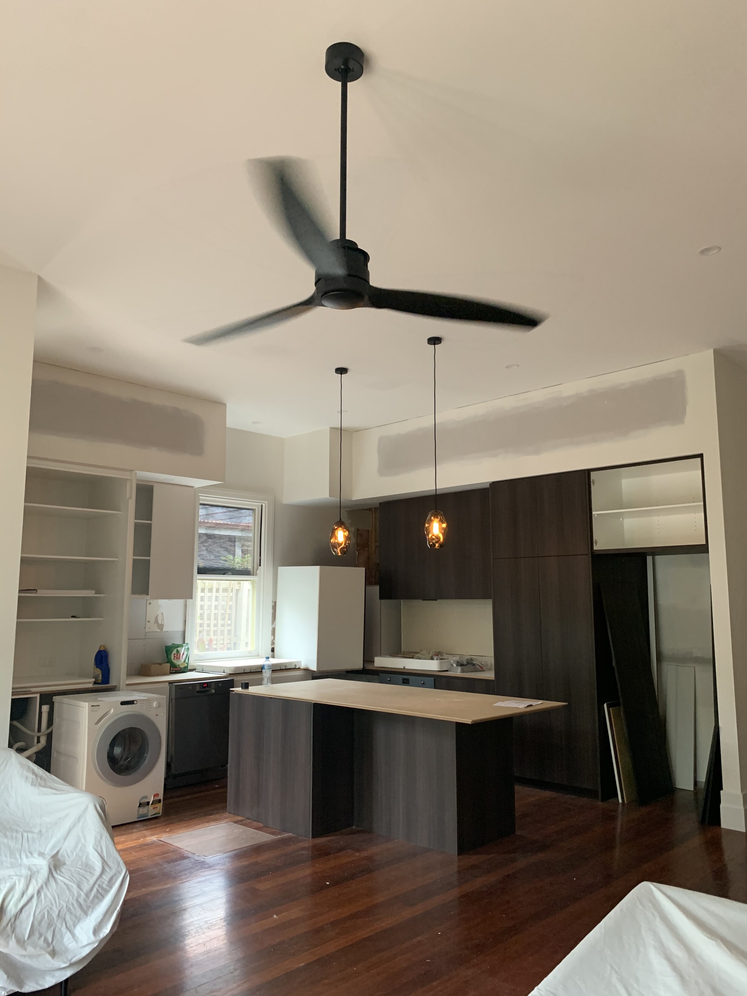Kitchen renovation including new pendant lighting and ceiling fan