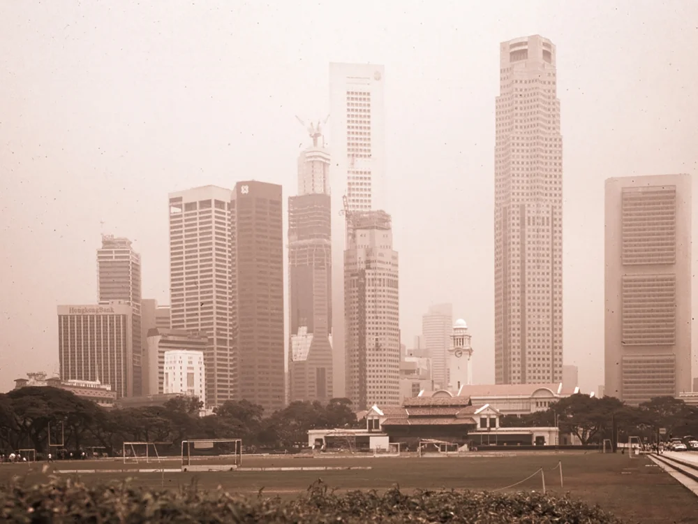 ... with the city being shrouded by the fumes from forest fires on Sumatra