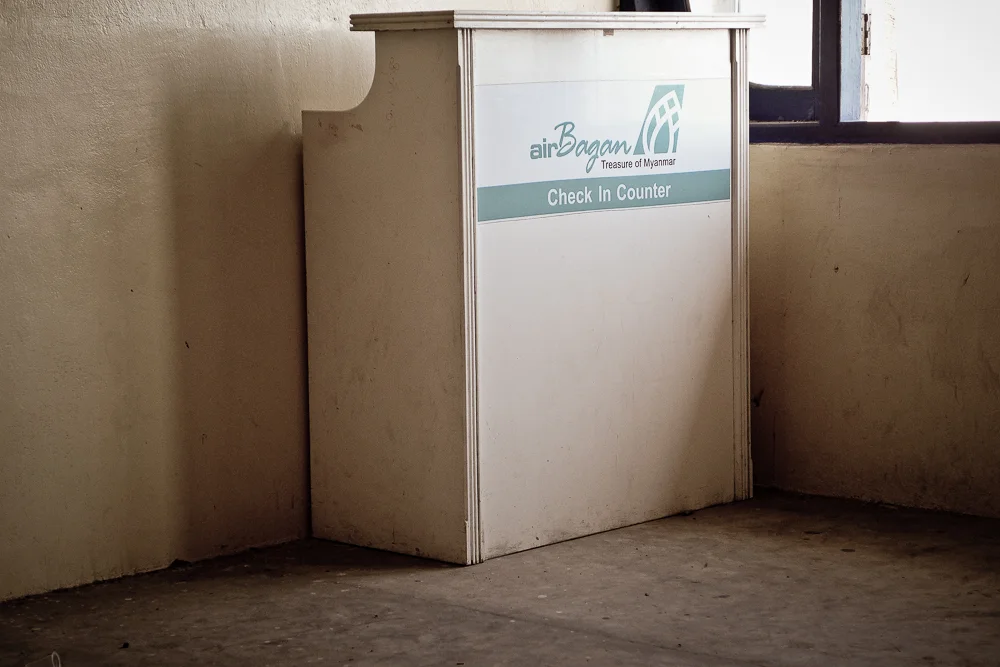 The Air Bagan check-in counter at Dawei airport, obviously defunct. Not that I cared to ever fly with them again.