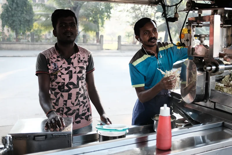 Sugarcane juice. (The empty street in the background? It is eight in the morning.)