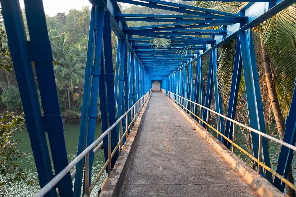 This narrow bridge is yet the only way to cross Talpona river near the coast. Yet.