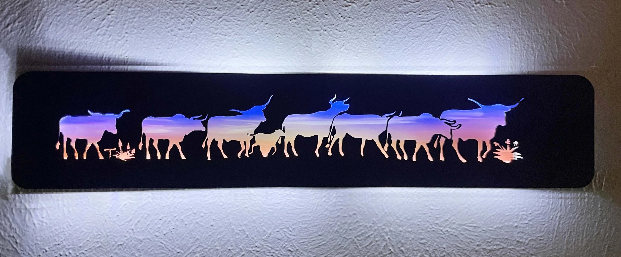 Lighted 24%22 MDF Line of Longhorns light on.jpg