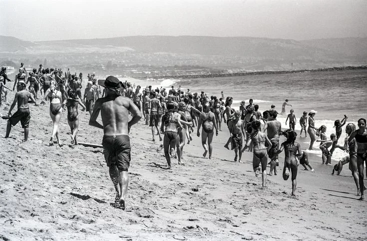 Junior lifeguards celebrate their graduation on Newport Beach. Photographed on Kodak BW400CN.