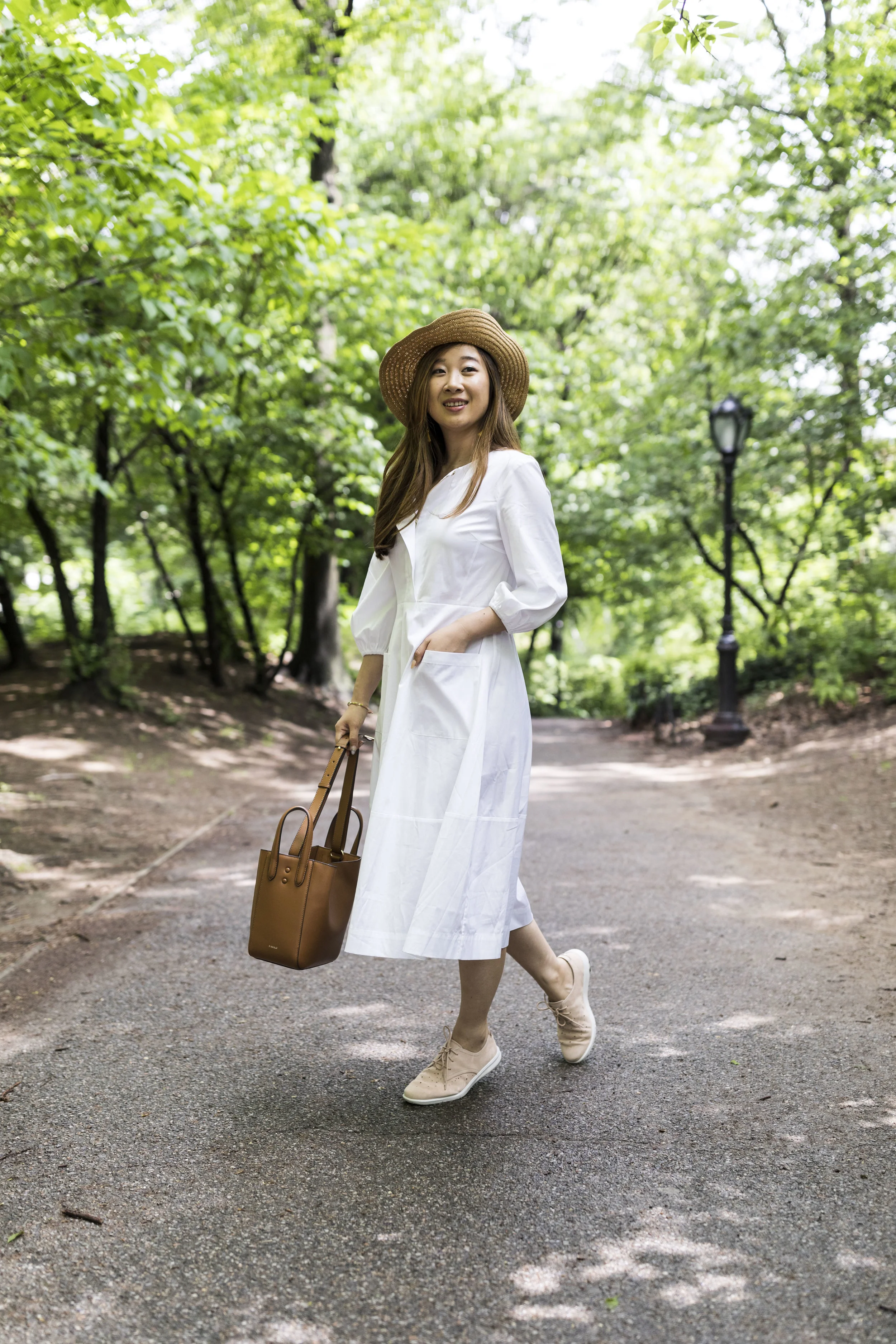 Dress: Cuyana; Bag: X Nihilo. Photos by Ashley Gallerani.