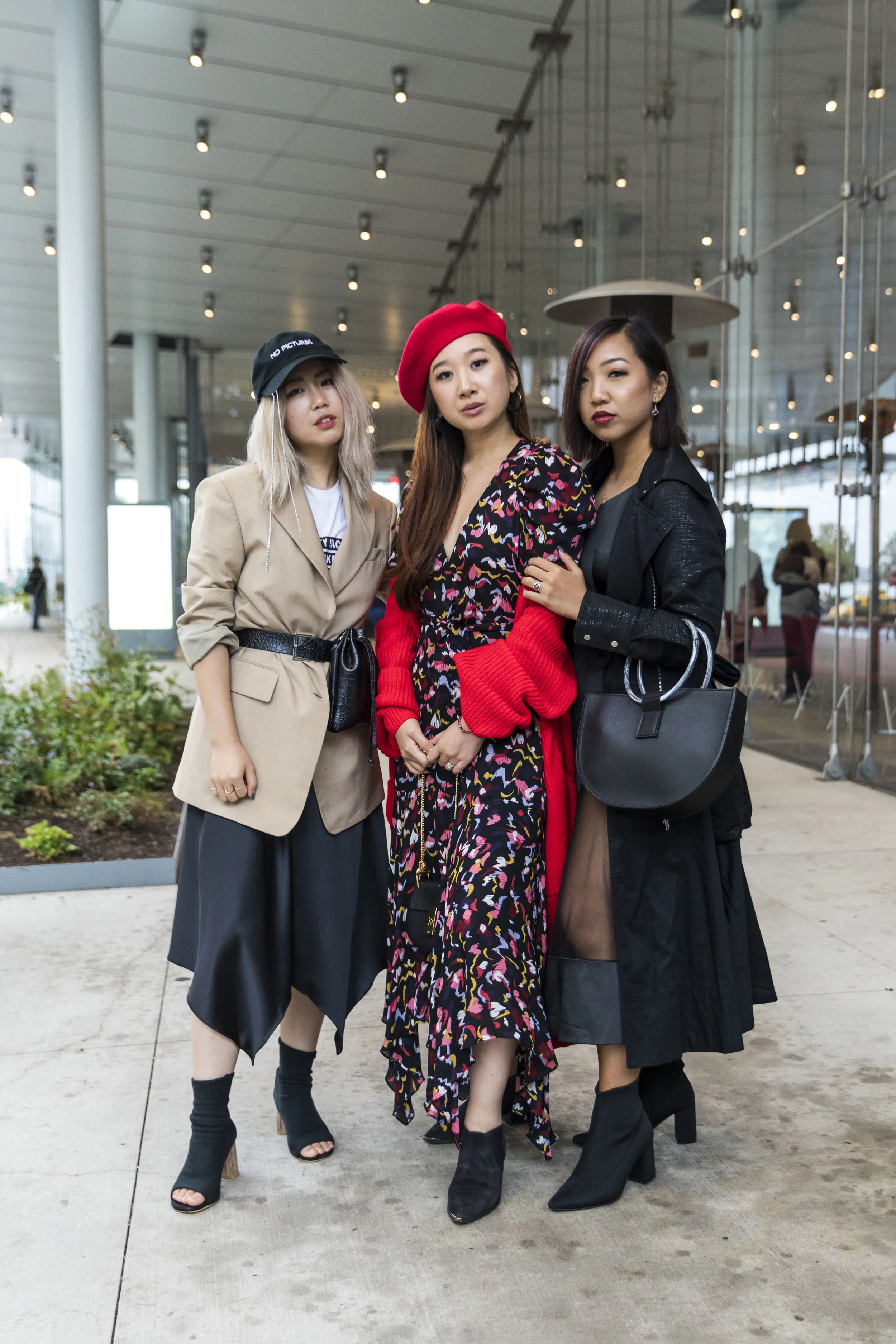 With Xin ( @xin.xue ) and Jenn ( @jennhanft ) before Ruby Fang ’s show at Industria. Photos taken by Ashley Gallerani .