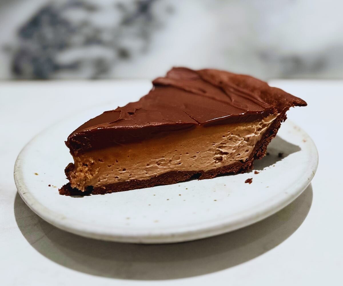 🚨 Milky Way Pie starts tomorrow!🚨

Inspired by the classic candy bar. This new pie includes a handmade milk chocolate cookie crust, soft chocolate cream filling topped with a layer of salted handmade chewy caramel and finished with a smooth chocola