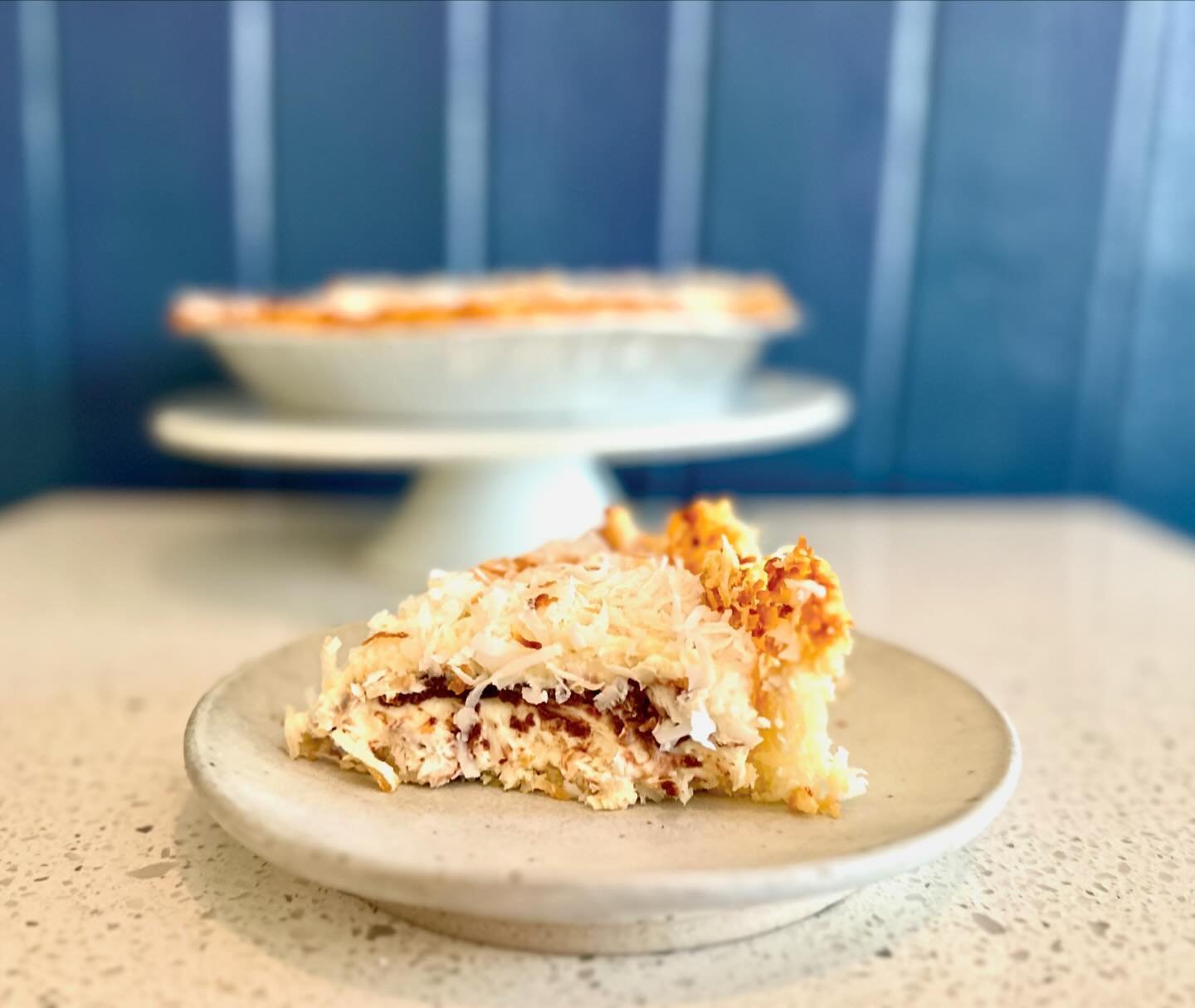 👋 Coconut Dream! 

Coconut macaroon shells with a light coconut cream filling, a layer of dark chocolate topped with toasted coconut. 

Pre-order for your Passover Seder! 

Contains dairy. Comes in Full Size and slices. GF.