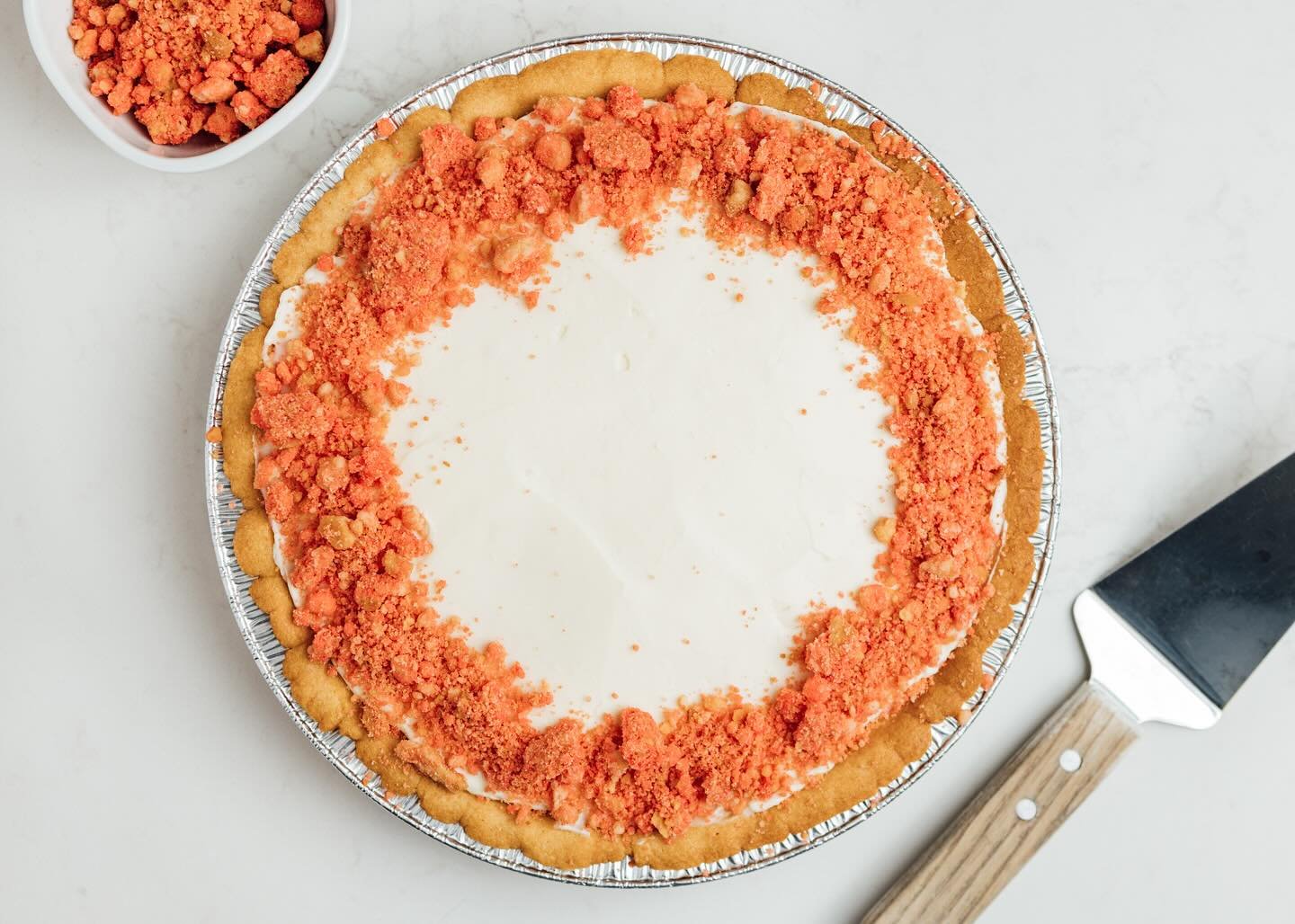 Bring on the pink! 💕It’s almost Valentine’s Day! 💓
Our fan favorite Strawberry Shortcake Pie is back! Inspired by the childhood favorite frozen dessert bar! Fluffy strawberry filling topped with housemade strawberry shortcake crumble.
