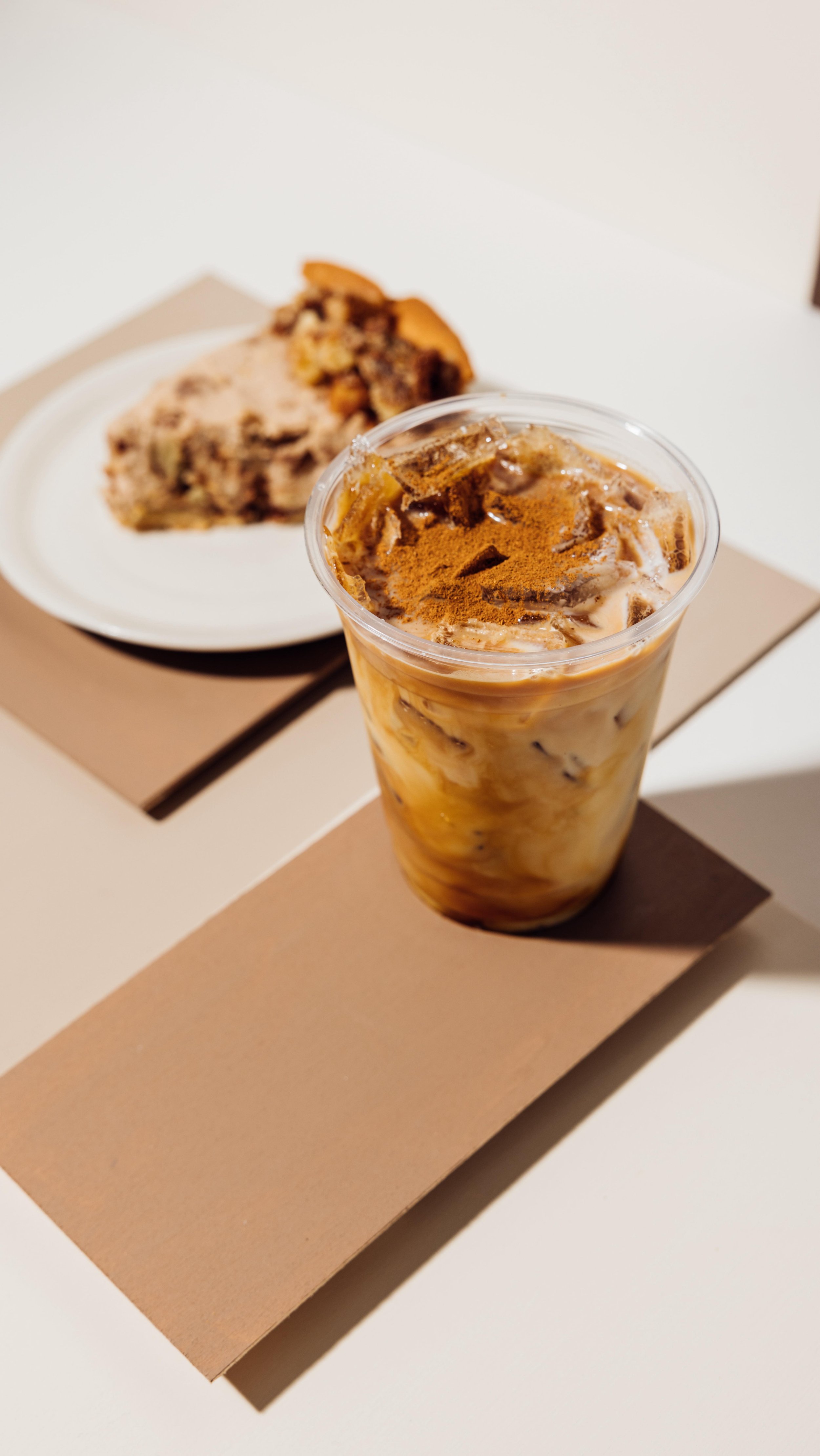 Beat the heat with an Iced Churro Latte made with our housemade Churro Latte syrup.