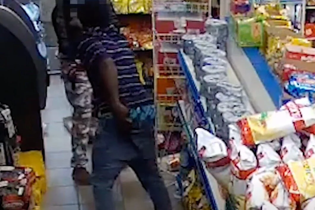 VIDEO | Person of Interest in Armed Robbery (Gun), 4200 b/o NH Burroughs Ave, NE