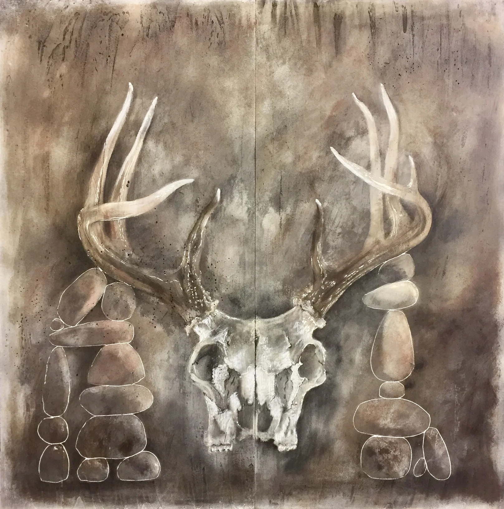 skull and cairn