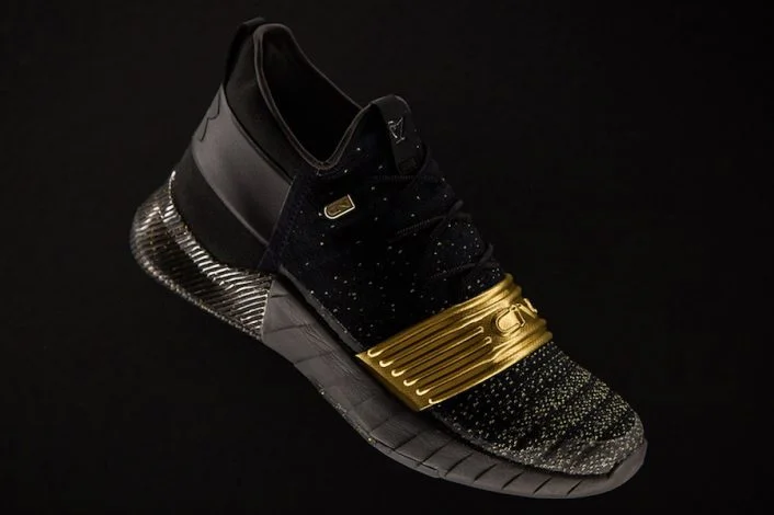ua-c1n-black-gold-1-706x470.jpg