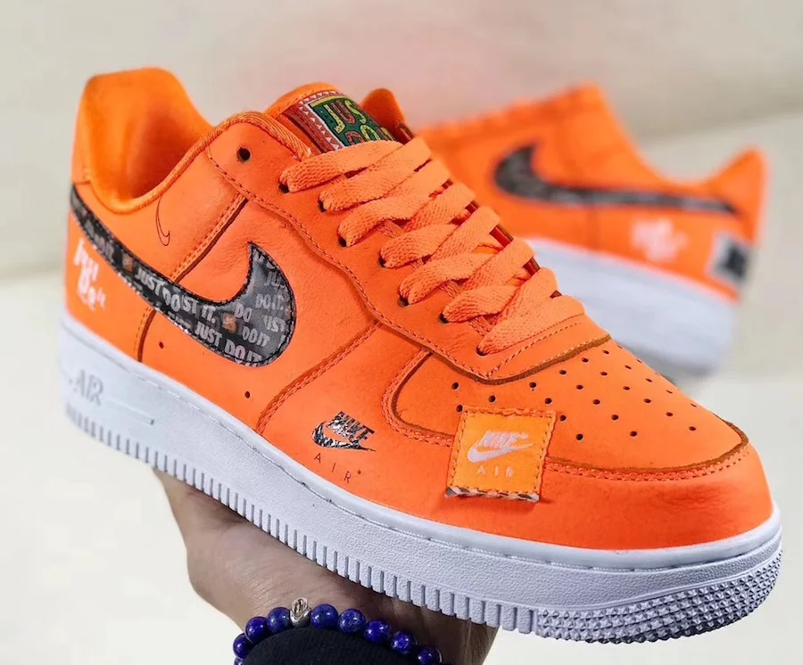 THE NIKE AIR FORCE 1 LOW “JUST DO IT” IN ORANGE