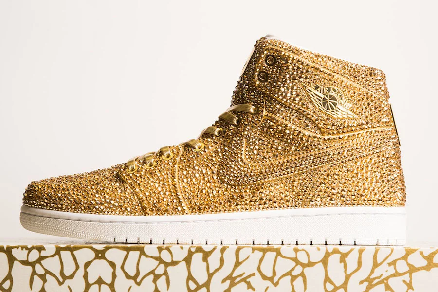 AIR JORDAN 1 “GOLDS” WITH A $6,500 PRICE TAG WAS MADE WITH OVER 15,000 CRYSTALS 
