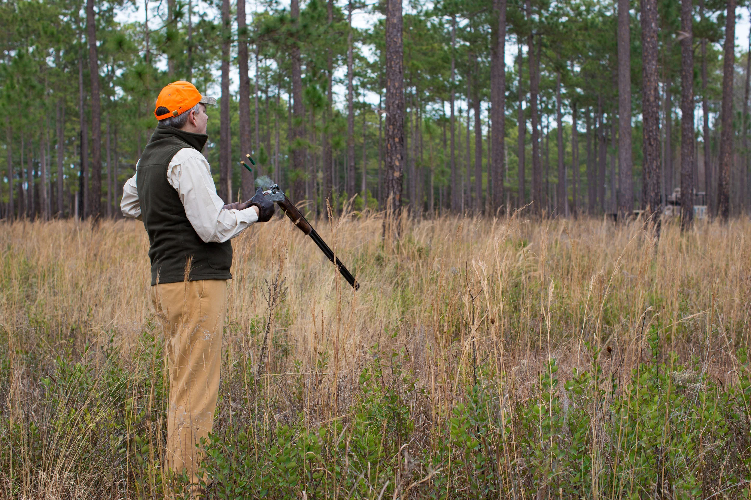 Shadow-Oak-Plantation-Hunter-loading-shotgun.jpg