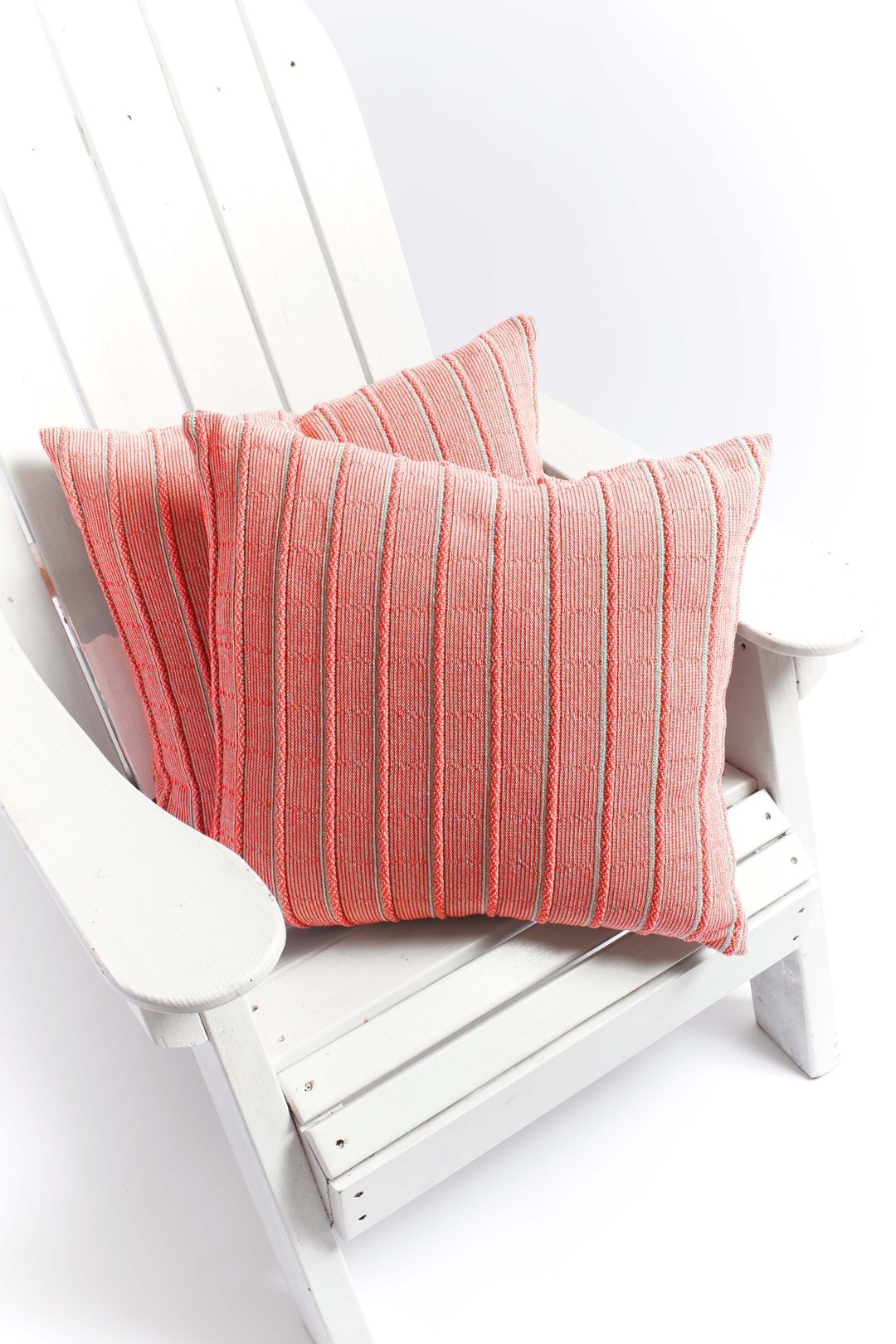 add textured color + comfort to any outdoor space with machine washable fade-resistant pillows knitted in the usa