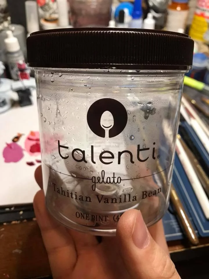 You can use any container for water. I suggest staying away from anything that you may drink out of. There are many horror stories of painters drinking dirty water from coffee mugs.