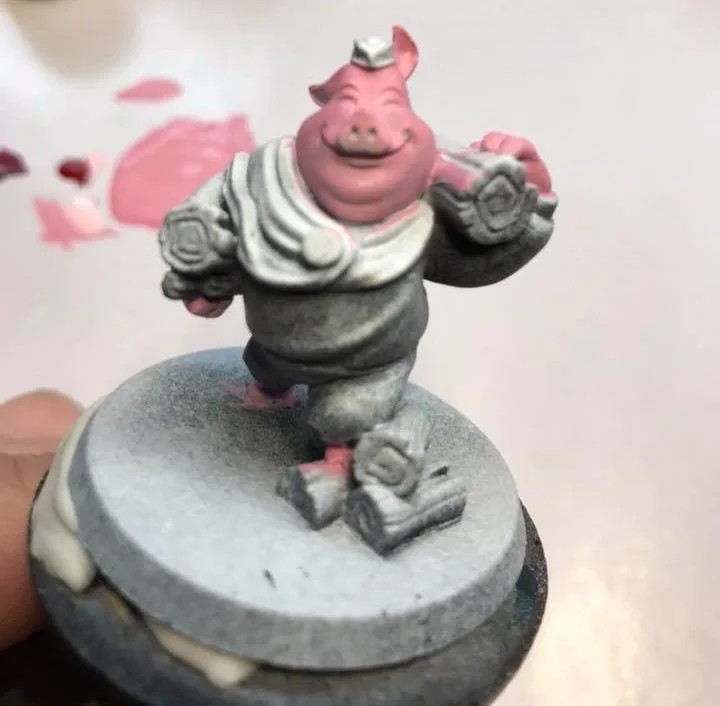 The first color is pink, used for the skin. I used a 6:1 mixture of Carnal Pink by P3 and Mephiston Red by Citadel. That is 6 drops to 1 drop of paint.